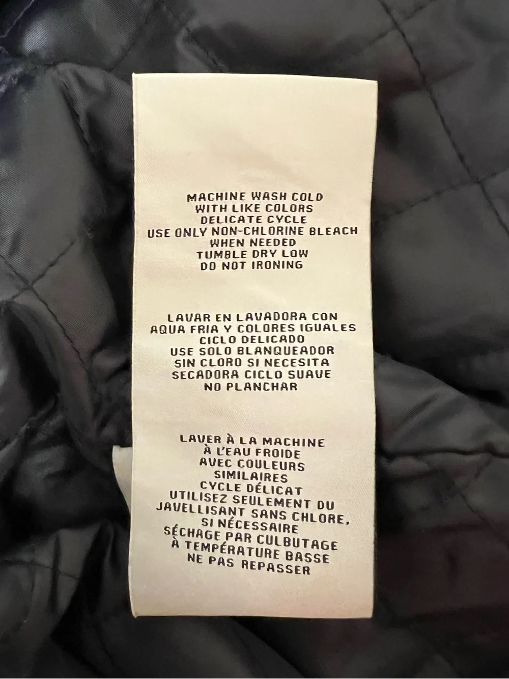Levi Strauss & Co. Black and White Varsity Jacket with Vegan Leather Sleeves